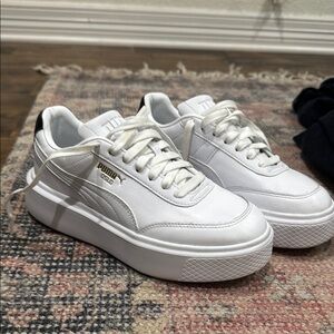PUMA White Sneakers with Gold Accents